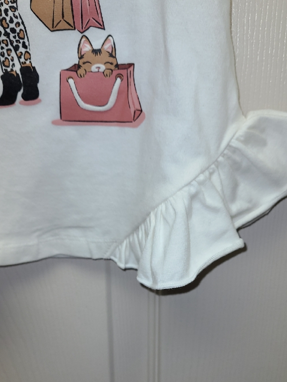 Cynthia Rowley White Long-Sleeve Ruffle Hem Top with shopping girl Graphic 12mo. - Picture 4 of 7